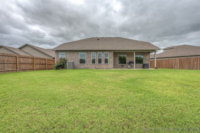13010 E 122nd Pl, Collinsville, OK 74021 - rear view of property with central air condition unit, brick siding, and roof with shingles