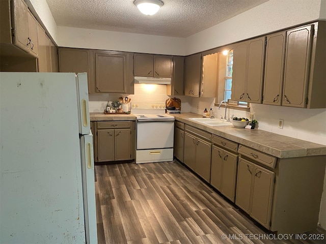 305 N 10th St, Hartshorne, OK 74547 - kitchen featuring white appliances, under cabinet range hood, a textured ceiling, dark wood-style flooring, and gray cabinetry