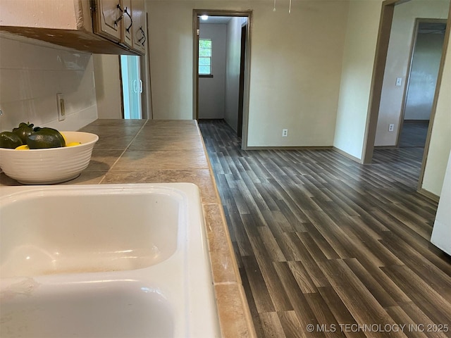 305 N 10th St, Hartshorne, OK 74547 - bathroom view of wood finished floors and baseboards