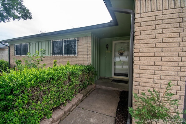 11612 E 28th St, Tulsa, OK 74129 - doorway to property with brick siding