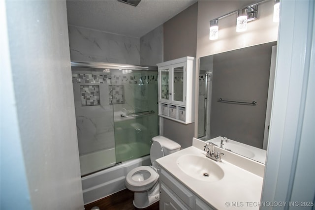 11612 E 28th St, Tulsa, OK 74129 - full bathroom with vanity, toilet, enclosed tub / shower combo, and a textured ceiling