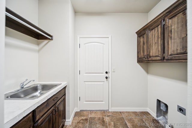16210 E 49th St, Tulsa, OK 74134 - laundry room with baseboards, cabinet space, and hookup for an electric dryer