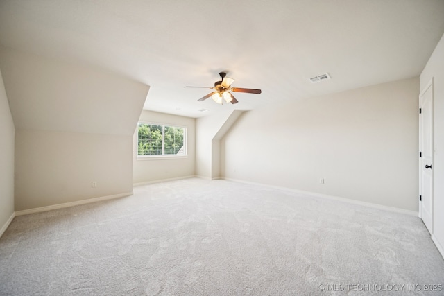 16210 E 49th St, Tulsa, OK 74134 - bonus room featuring ceiling fan, light carpet, and baseboards