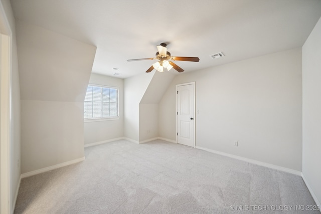 16210 E 49th St, Tulsa, OK 74134 - additional living space with light colored carpet, ceiling fan, and baseboards