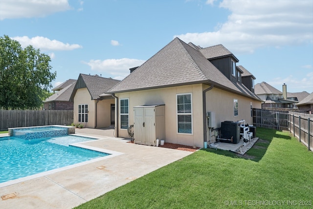 16210 E 49th St, Tulsa, OK 74134 - view of pool featuring a patio area, a pool with connected hot tub, and central air condition unit