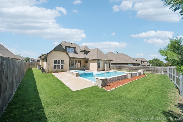 16210 E 49th St, Tulsa, OK 74134 - view of swimming pool featuring a pool with connected hot tub, a patio area, and central air condition unit