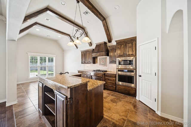 16210 E 49th St, Tulsa, OK 74134 - kitchen with stainless steel appliances, open shelves, an island with sink, backsplash, and dark brown cabinetry