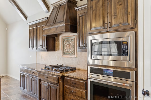16210 E 49th St, Tulsa, OK 74134 - kitchen with stainless steel appliances, custom exhaust hood, decorative backsplash, stone countertops, and beam ceiling