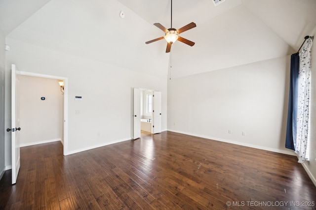 16210 E 49th St, Tulsa, OK 74134 - unfurnished living room featuring a ceiling fan, high vaulted ceiling, dark wood-type flooring, and baseboards