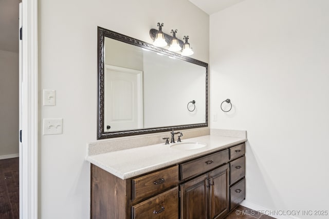 16210 E 49th St, Tulsa, OK 74134 - bathroom featuring vanity and baseboards