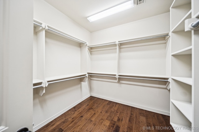 16210 E 49th St, Tulsa, OK 74134 - spacious closet with dark wood-type flooring