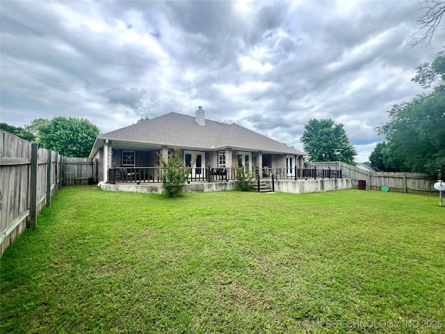 1403 NW Mimosa Cir, Stigler, OK 74462 - back of house with a chimney