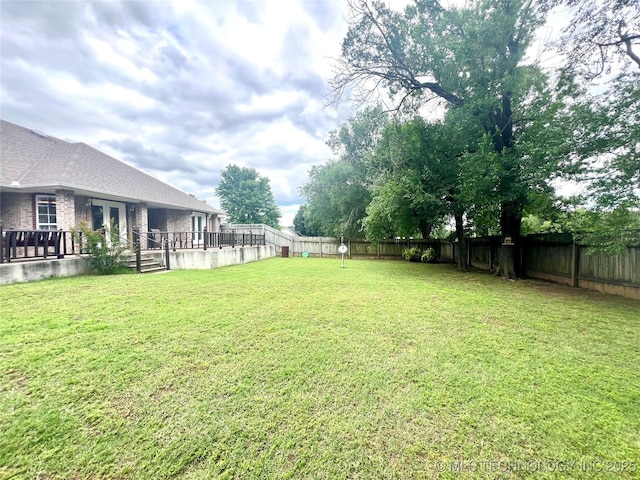 1403 NW Mimosa Cir, Stigler, OK 74462 - view of yard featuring french doors and a deck