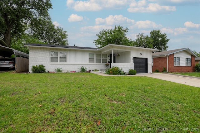 4524 E 45th St, Tulsa, OK 74135 - view of front of home with an attached garage, brick siding, concrete driveway, and a front lawn