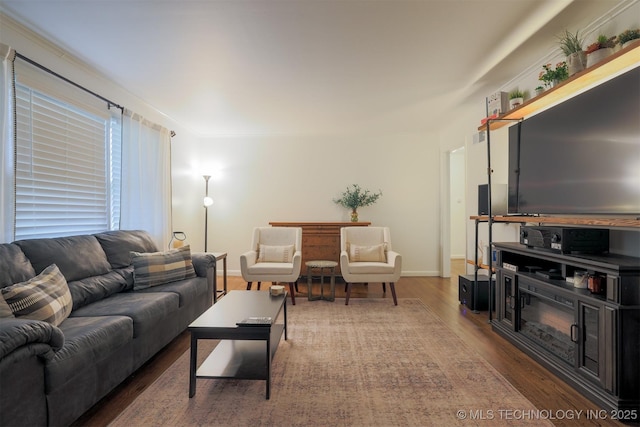 4524 E 45th St, Tulsa, OK 74135 - living room featuring wood finished floors and baseboards