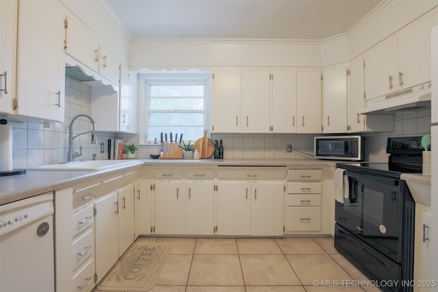 4524 E 45th St, Tulsa, OK 74135 - kitchen with under cabinet range hood, electric range, dishwasher, a sink, and tasteful backsplash