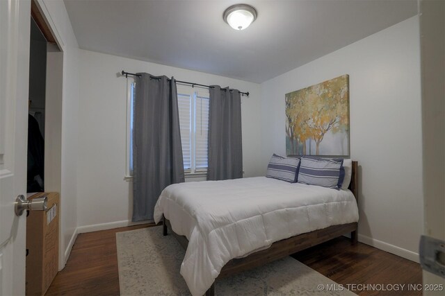 4524 E 45th St, Tulsa, OK 74135 - bedroom featuring wood finished floors and baseboards