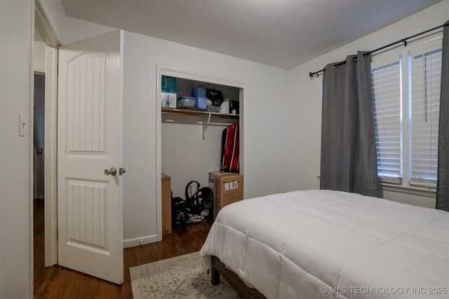 4524 E 45th St, Tulsa, OK 74135 - bedroom featuring wood finished floors and a closet