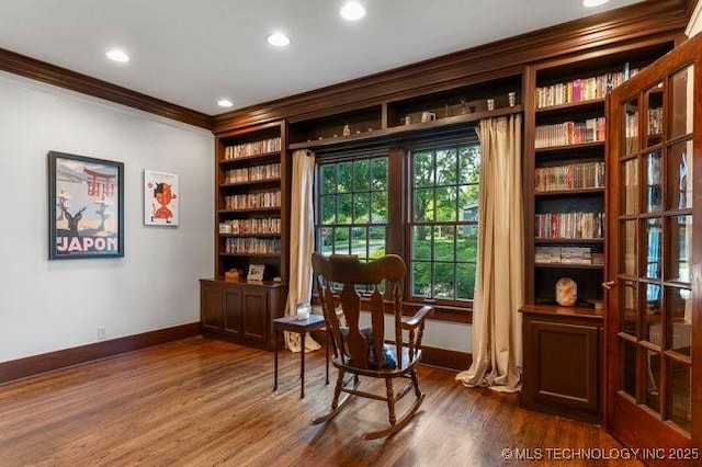 1701 S Rockford Ave, Tulsa, OK 74120 - sitting room featuring crown molding, baseboards, dark wood-style flooring, built in features, and recessed lighting