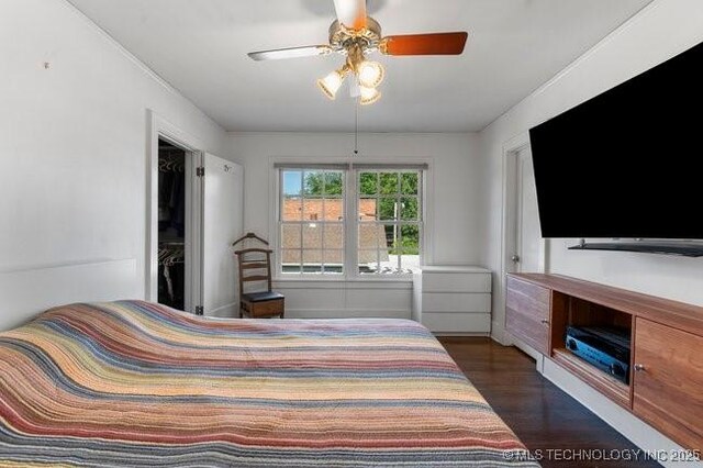 1701 S Rockford Ave, Tulsa, OK 74120 - bedroom featuring dark wood finished floors and a ceiling fan
