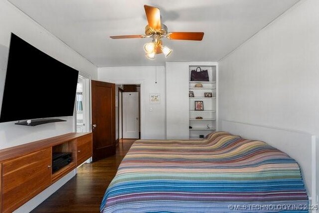 1701 S Rockford Ave, Tulsa, OK 74120 - bedroom featuring dark wood-type flooring and ceiling fan