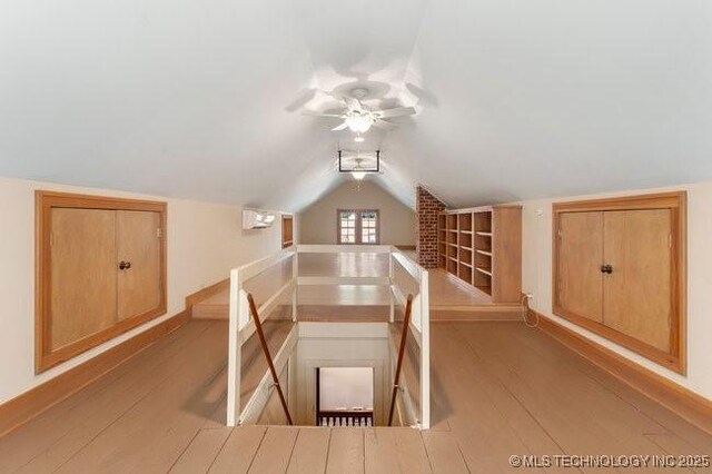 1701 S Rockford Ave, Tulsa, OK 74120 - bonus room with wood finished floors, vaulted ceiling, and ceiling fan