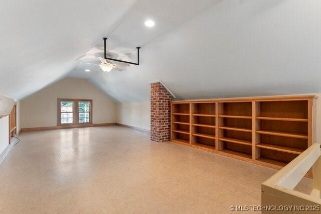 1701 S Rockford Ave, Tulsa, OK 74120 - additional living space with lofted ceiling, a ceiling fan, baseboards, and recessed lighting