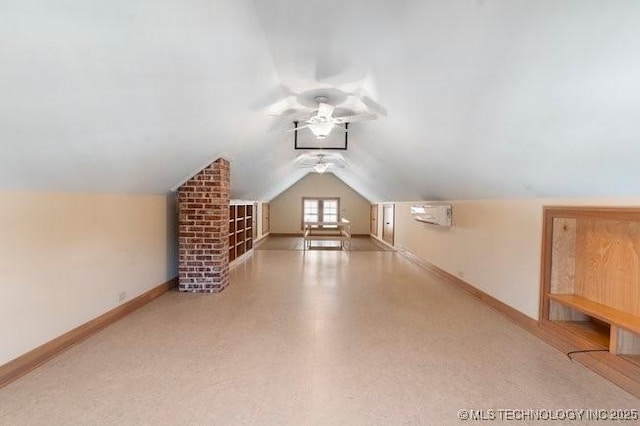 1701 S Rockford Ave, Tulsa, OK 74120 - bonus room with a ceiling fan, baseboards, lofted ceiling, and a wall mounted air conditioner