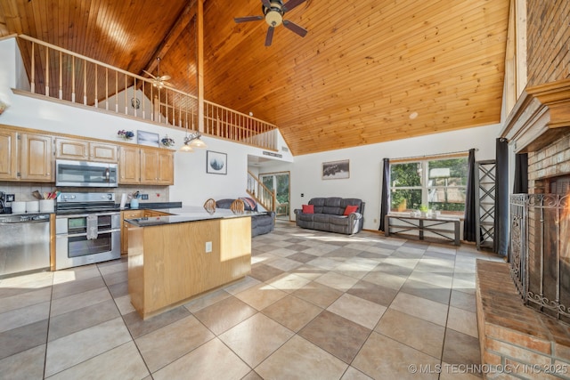 750 Spavinaw Hudson Pt, Spavinaw, OK 74366 - kitchen with appliances with stainless steel finishes, a ceiling fan, high vaulted ceiling, open floor plan, and wood ceiling with exposed beams