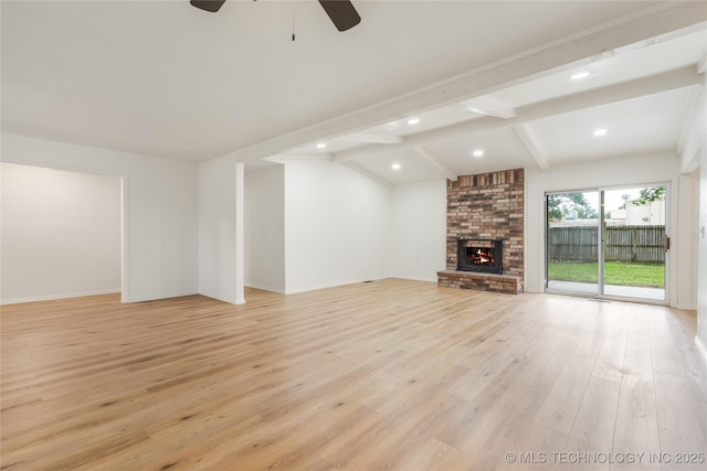 2230 W Haskell St, Tulsa, OK 74127 - unfurnished living room featuring a ceiling fan, light wood finished floors, a fireplace, beam ceiling, and recessed lighting