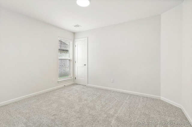 6512 N 27th St, Broken Arrow, OK 74014 - unfurnished room featuring carpet floors and baseboards