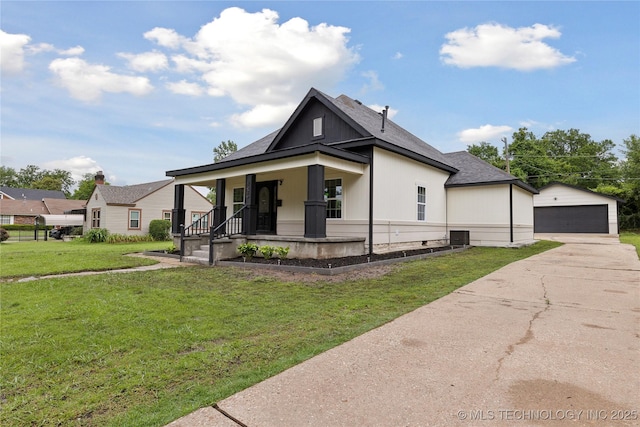 4526 W Broadway St, Muskogee, OK 74401 - view of front of house with a porch, a garage, an outbuilding, a front lawn, and a shingled roof