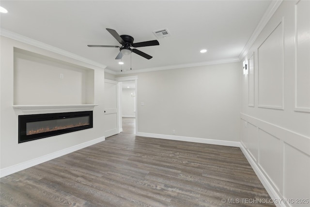 4526 W Broadway St, Muskogee, OK 74401 - unfurnished living room with a glass covered fireplace, recessed lighting, wood finished floors, a ceiling fan, and crown molding