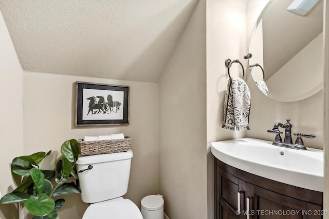 14355 N Trenton Ave, Skiatook, OK 74070 - half bath featuring vaulted ceiling, vanity, and a textured ceiling