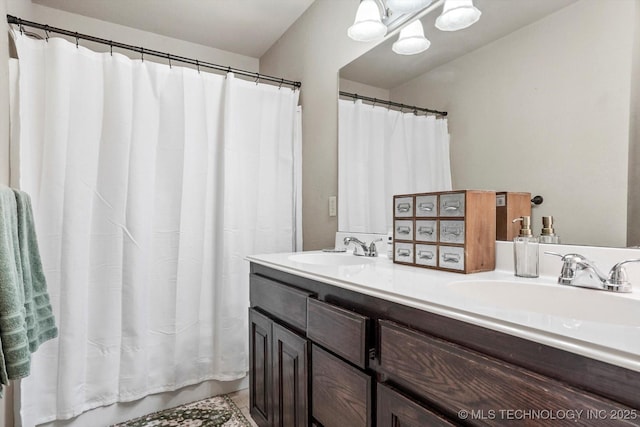 14355 N Trenton Ave, Skiatook, OK 74070 - full bathroom with double vanity, a chandelier, and a shower with shower curtain