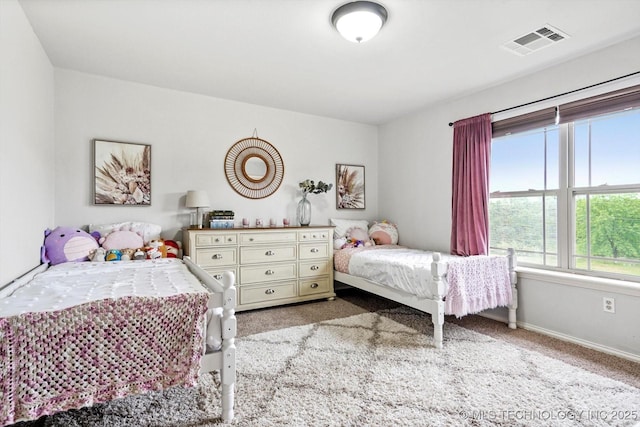 14355 N Trenton Ave, Skiatook, OK 74070 - bedroom with carpet flooring and baseboards