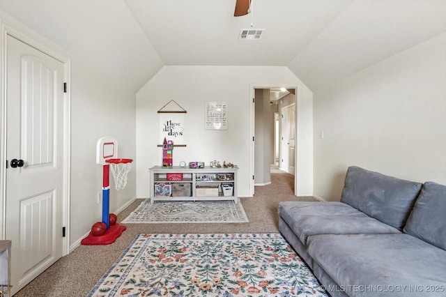 14355 N Trenton Ave, Skiatook, OK 74070 - carpeted living area with a ceiling fan and vaulted ceiling