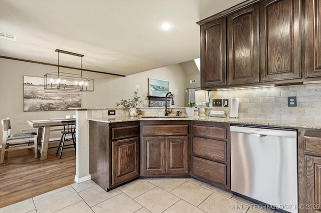 14355 N Trenton Ave, Skiatook, OK 74070 - kitchen featuring stainless steel dishwasher, a peninsula, dark brown cabinetry, light tile patterned floors, and recessed lighting