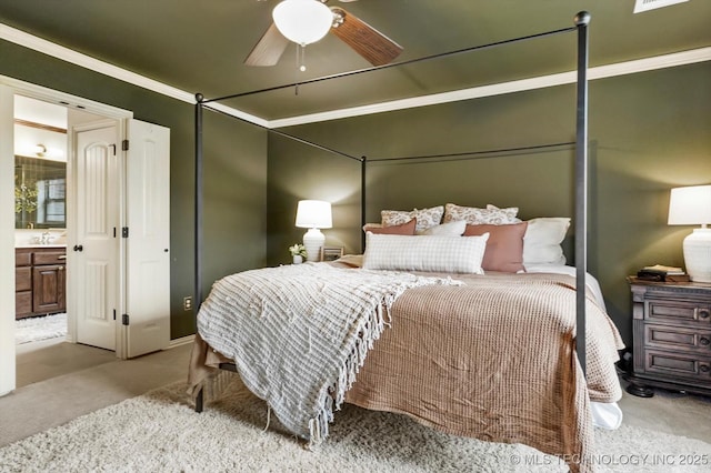 14355 N Trenton Ave, Skiatook, OK 74070 - carpeted bedroom featuring crown molding, ensuite bath, and ceiling fan
