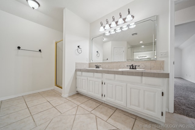 9227 S 95th E Ave, Tulsa, OK 74133 - full bath featuring decorative backsplash, double vanity, a stall shower, tile patterned floors, and baseboards
