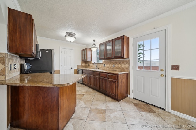 9227 S 95th E Ave, Tulsa, OK 74133 - kitchen featuring a textured ceiling, tasteful backsplash, glass insert cabinets, appliances with stainless steel finishes, and ornamental molding
