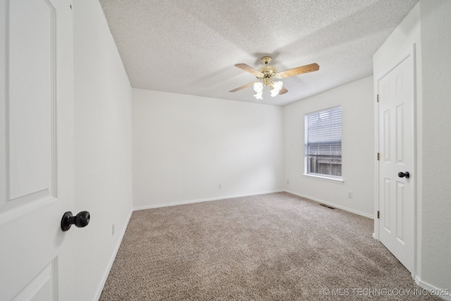 9227 S 95th E Ave, Tulsa, OK 74133 - carpeted empty room with ceiling fan, a textured ceiling, and baseboards