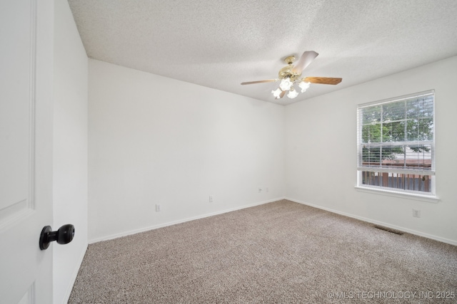 9227 S 95th E Ave, Tulsa, OK 74133 - carpeted spare room featuring ceiling fan, a textured ceiling, and baseboards