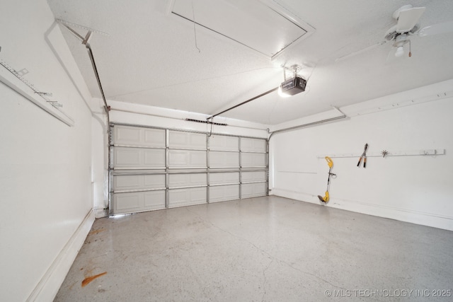 9227 S 95th E Ave, Tulsa, OK 74133 - garage featuring a garage door opener