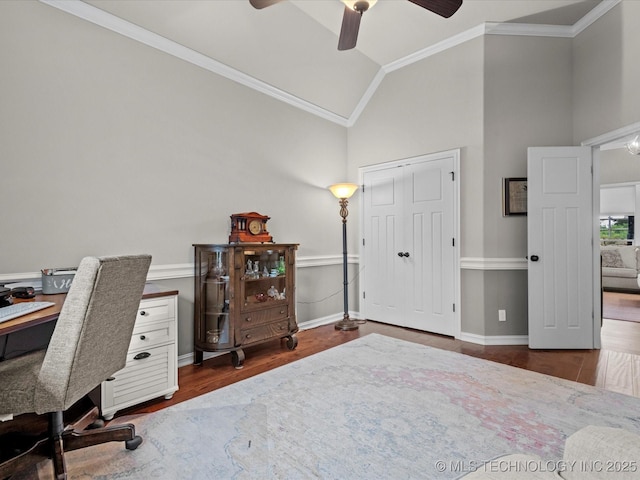 5615 Cooper Ct, Bartlesville, OK 74006 - home office featuring crown molding, ceiling fan, lofted ceiling, wood finished floors, and baseboards