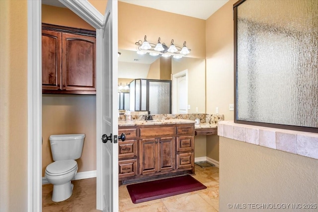 15065 N 148th Ave E, Collinsville, OK 74021 - full bathroom featuring vanity, a stall shower, toilet, and baseboards