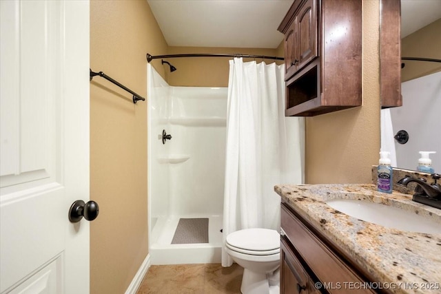 15065 N 148th Ave E, Collinsville, OK 74021 - full bath with vanity, toilet, a stall shower, and baseboards