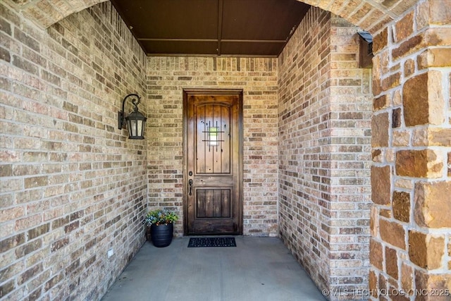 15065 N 148th Ave E, Collinsville, OK 74021 - doorway to property featuring brick siding