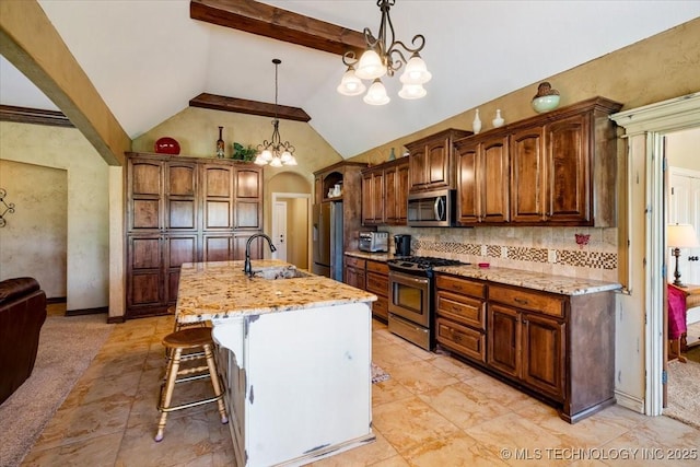 15065 N 148th Ave E, Collinsville, OK 74021 - kitchen featuring stainless steel appliances, a sink, a breakfast bar, tasteful backsplash, and beamed ceiling