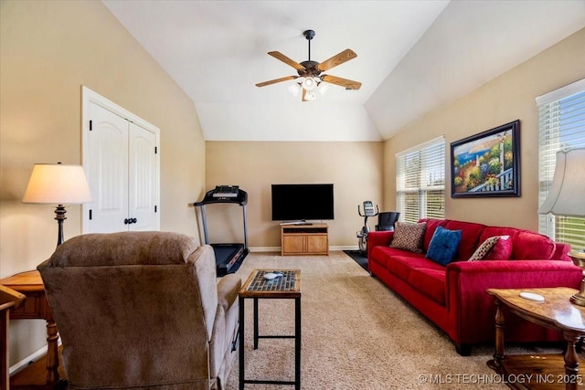 15065 N 148th Ave E, Collinsville, OK 74021 - carpeted living room with a ceiling fan, lofted ceiling, and baseboards